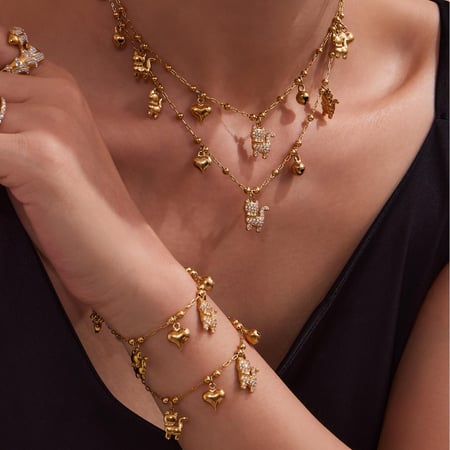 Delicados y lindos conjuntos de joyas de acero inoxidable con circonitas de color dorado para mujer. 2