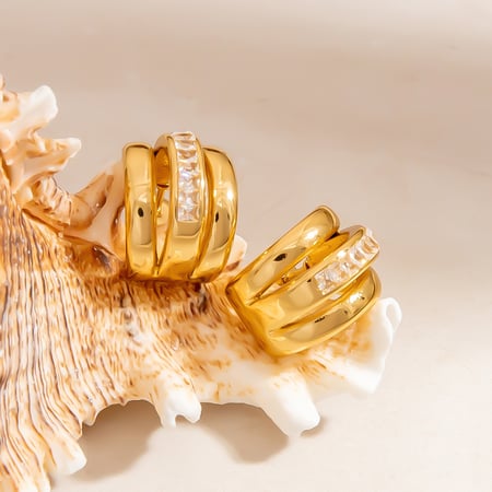 1 par de pendientes de aro de acero inoxidable para mujer, románticos, elegantes y con forma irregular.