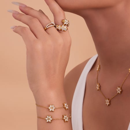Hermosos conjuntos de joyas para mujer con circonitas de color dorado y acero inoxidable con flores