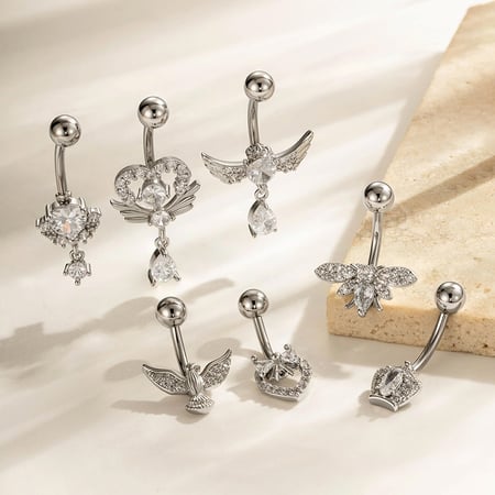 Piercing de nombril en forme de nœud papillon en cuivre doré et zircon