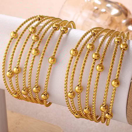 Bracelet manchette rétro multicouche en acier inoxydable doré à motif torsadé
