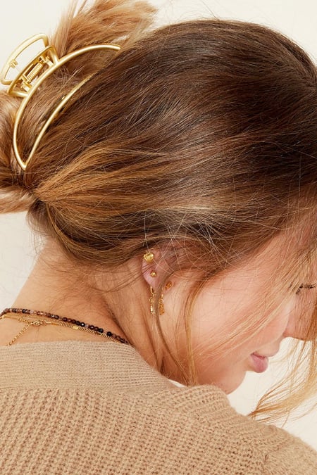 Large metal hair clip in gold color in the shape of a crescent moon Vintage gold