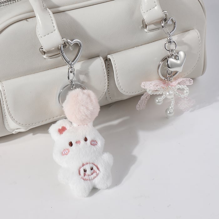 1 Stück einfache Serie süße Tierlegierung Damen Taschenanhänger Bild4