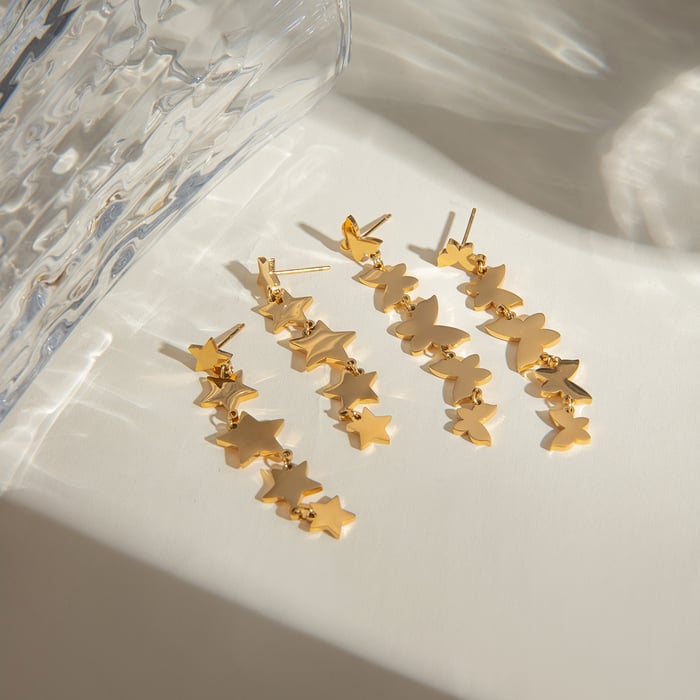 europäischer und amerikanischer grenzüberschreitender -stil, schlichter 18 karat gold-edelstahl, glatte ganze schnur, kleine schmetterlingsquasten-ohrringe, ohrschmuck für frauen h5Bild3