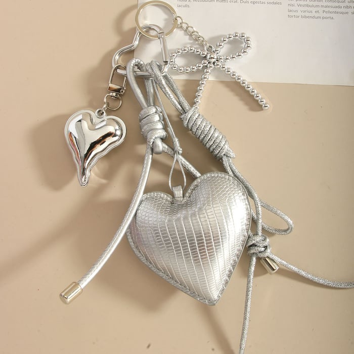 Breloques de sac pour femme en corde tressée avec nœud en forme de cœur en PU argenté de qualité supérieure Image4