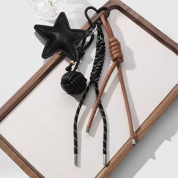 1 Stück Leder-Taschenanhänger mit gewebtem Stern und Ball h5Bild5