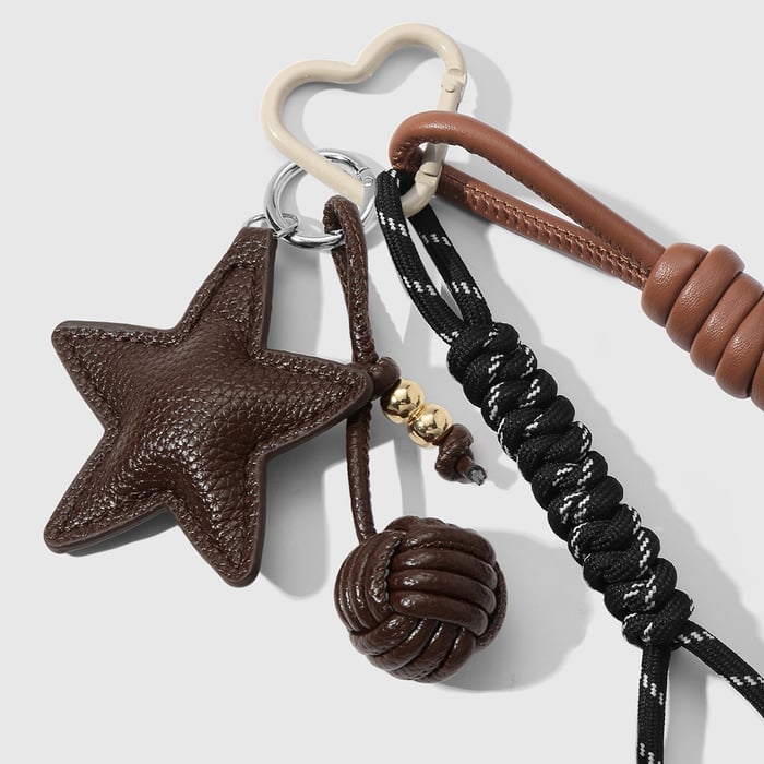 1 Stück Leder-Taschenanhänger mit gewebtem Stern und Ball h5Bild4