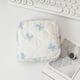 Blue bow on white background