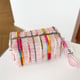 Hand-held pillow with woolen stripes. Pink Picture6