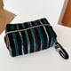 Hand-held pillow with woolen stripes. Black Picture5