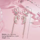 Silver needle. Heart tassel