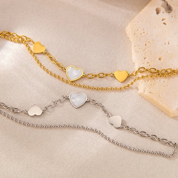 Armbanden met bedeltjes van roestvrij staal in goudkleur met hartjesmotief 2