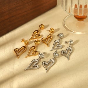 1 par de pendientes femeninos sencillos y originales de acero inoxidable chapados en Color dorado de 18 quilates con forma de corazón hueco h5 Imagen2