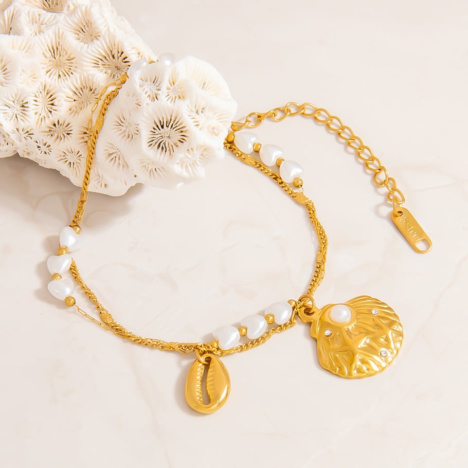 Pulseras con dijes de acero inoxidable color dorado oceánico Imagen6
