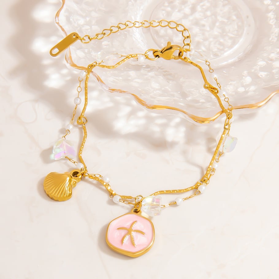 Pulseras con dijes de acero inoxidable color dorado oceánico Imagen3