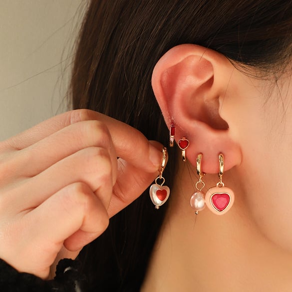 1 juego de pendientes de aleación de color dorado con forma de corazón exquisitos de serie de moda para mujer