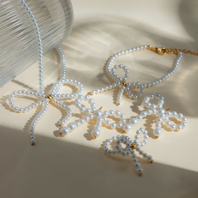 Europäische und amerikanische grenzüberschreitende INS-Stil Mode Licht Luxus High-End 18 Karat Gold Edelstahl Bogen Perle Ohrringe Ohrringe Zubehör für Frauen h5 Bild2
