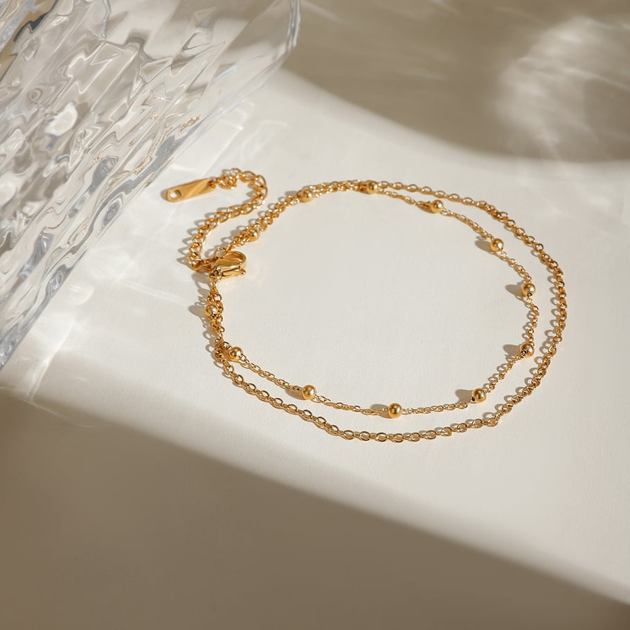 Sommeraccessoires neue europäische und amerikanische Nischenmode Allgleiches 18 Karat Gold Edelstahl Doppelschicht Runde Perlenkette Fußkettchen Schmuck weiblich Bild2