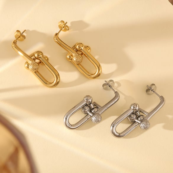 1 par de aretes de botón de acero de titanio dorado con diseño geométrico sutil para mujer 2