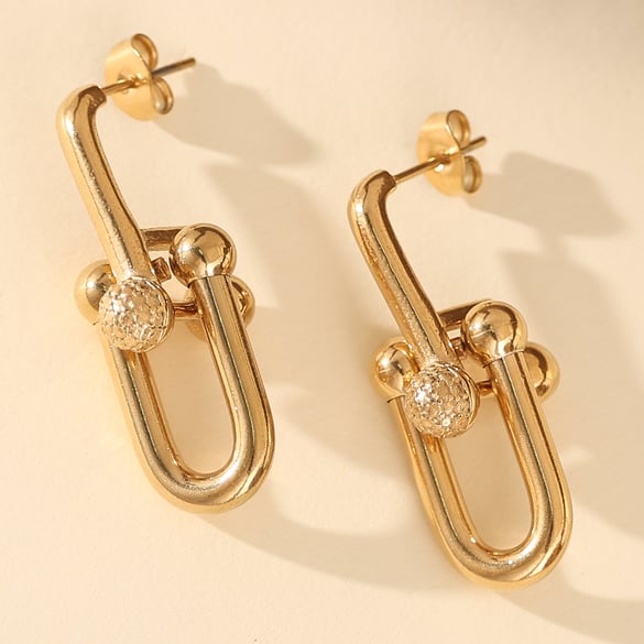 1 par de aretes de botón de acero de titanio dorado con diseño geométrico sutil para mujer