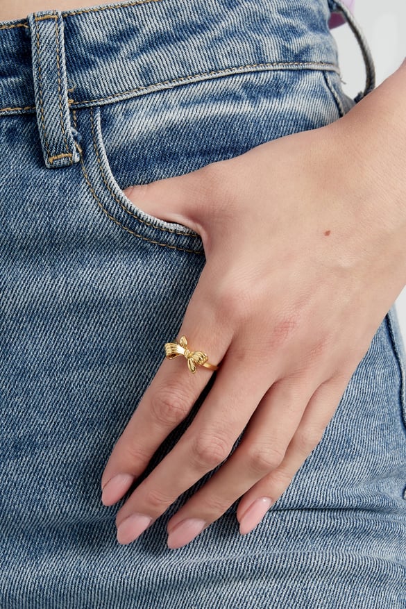 anello con fiocco inverso - colore oro