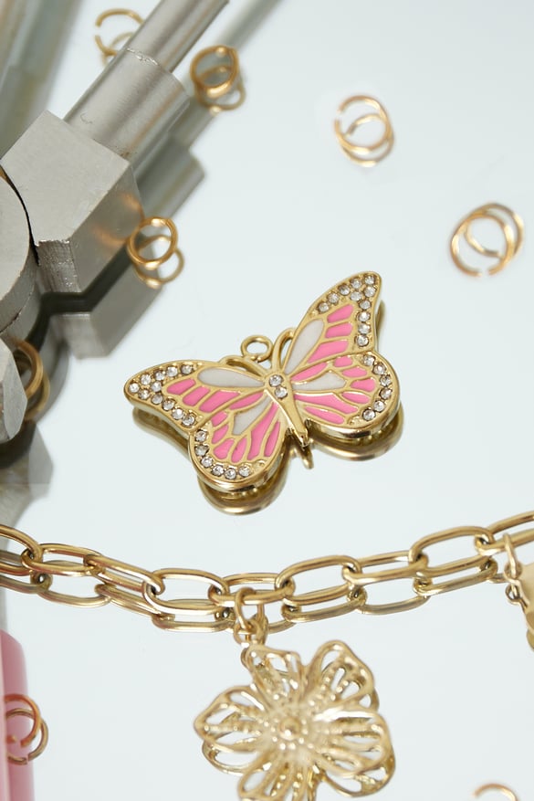 Pink butterfly charm - fuchsia