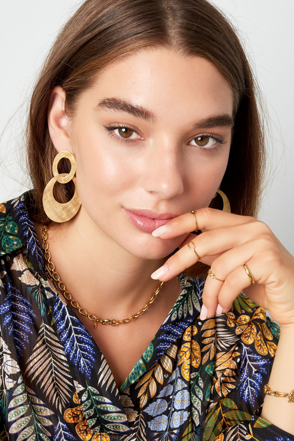 earrings connected ovals