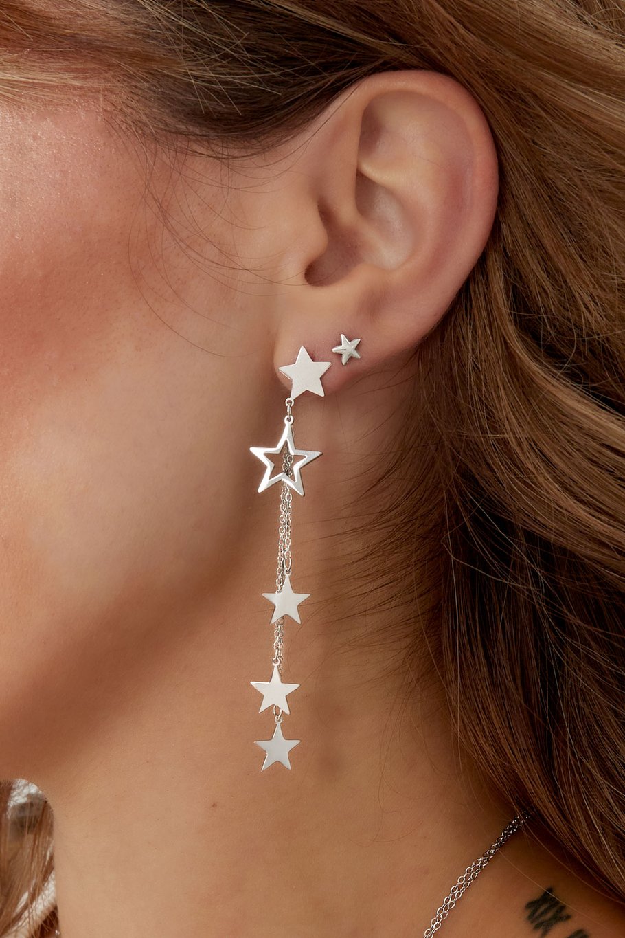 orecchini stelle e collana - colore oro Immagine3