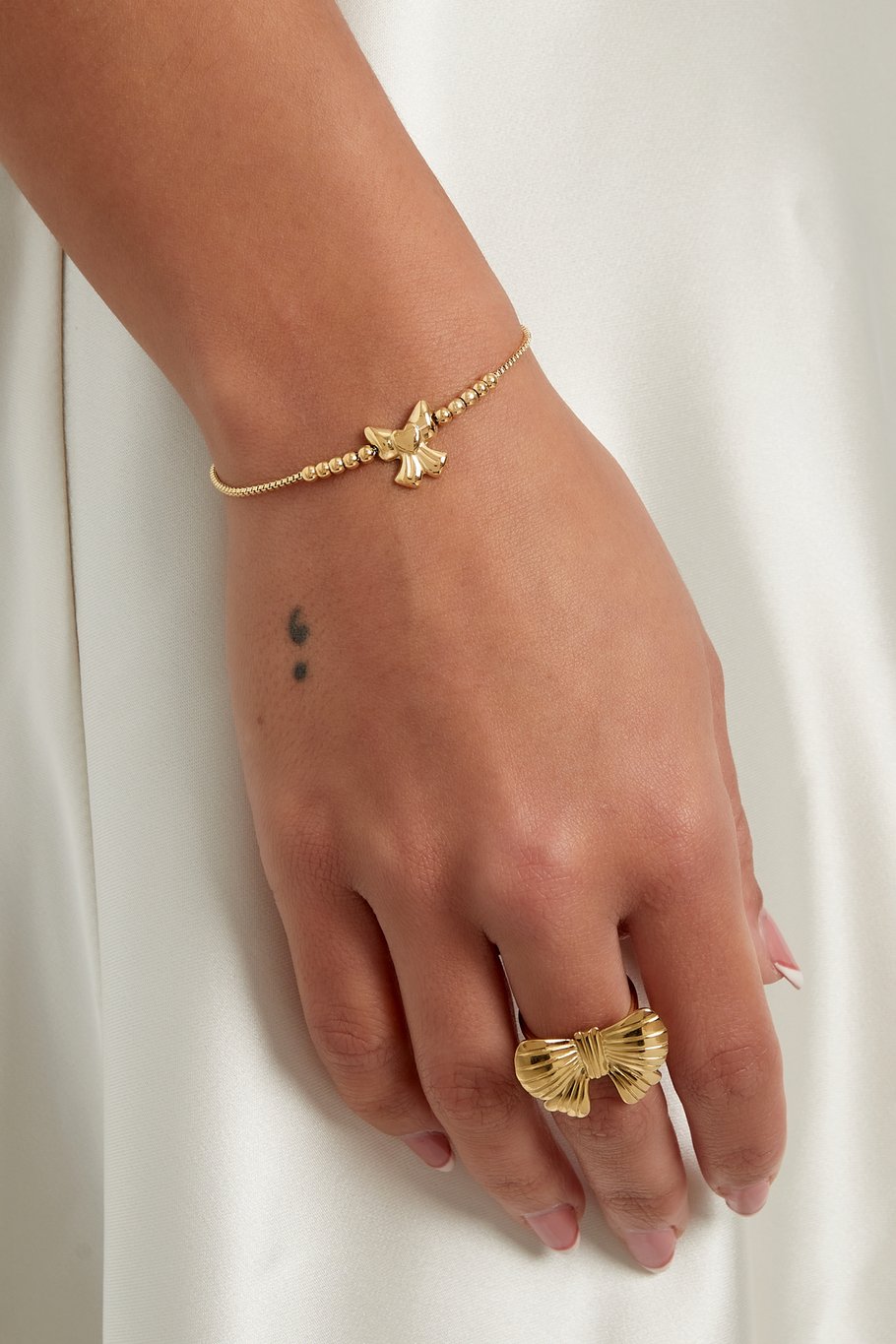 Süßes Schleifen-Armband mit Perlen - Goldfarbe  Bild3