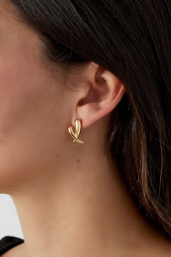 crossed earrings