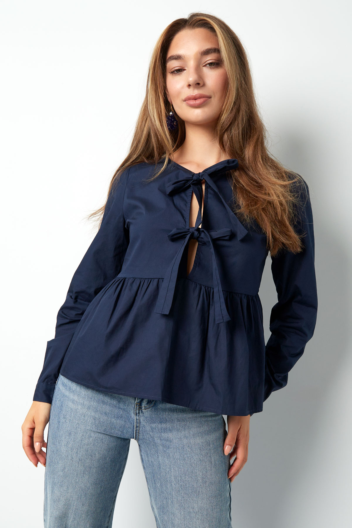 Longsleeve peplum top met strikjes - beige