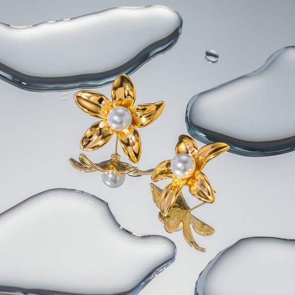 European and American cross-border INS style personality trend 18k gold stainless steel inlaid pearl flower earrings earrings jewelry wholesale