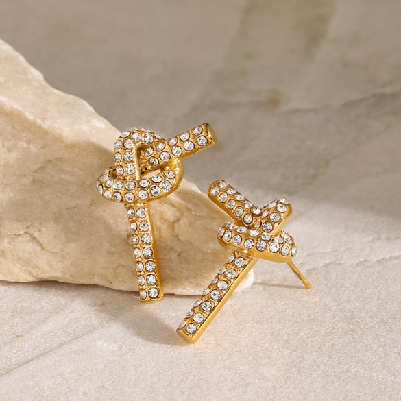 18k gouden roestvrij staal/volledige diamanten geknoopte oorbellen in stijl modieuze schattige kleine frisse titanium stalen knoop oorbellen