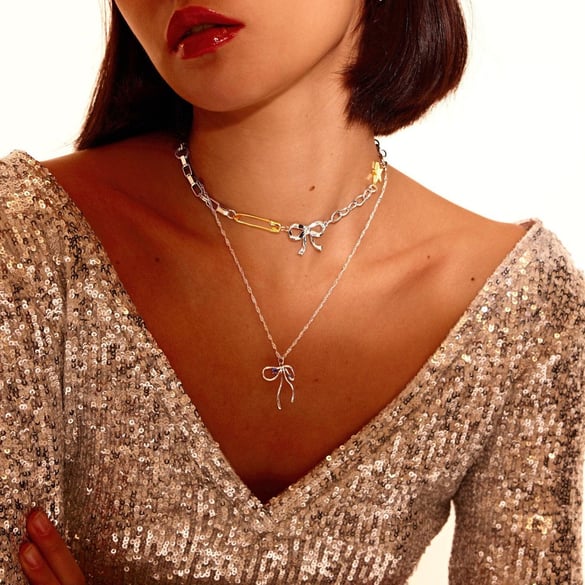 1 pezzo semplice serie retrò fiocco nodo acciaio inossidabile placcato oro 18K donne collane con ciondolo 2