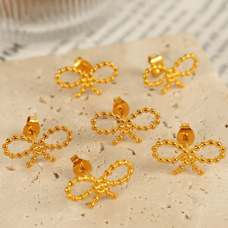 1 par de aretes de botón de acero inoxidable chapados en oro de 18 quilates con nudo de lazo para mujer Imagen9