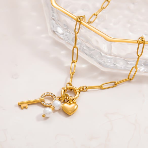 Collier avec pendentif en acier inoxydable plaqué or 18 carats et perles artificielles pour femme, série luxueuse, simple et élégant 2