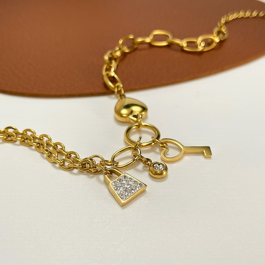 1 pezzo semplice serie cuore semplice acciaio inossidabile colore oro braccialetti con ciondoli da donna Immagine13
