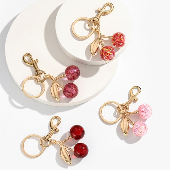 1 pieza de dijes para bolso de mujer de resina color dorado con diseño de planta dulce de serie simple 2