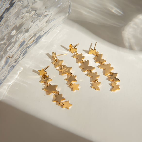 European and American cross-border INS style simple 18k gold stainless steel smooth whole string small butterfly tassel earrings earrings accessories for women