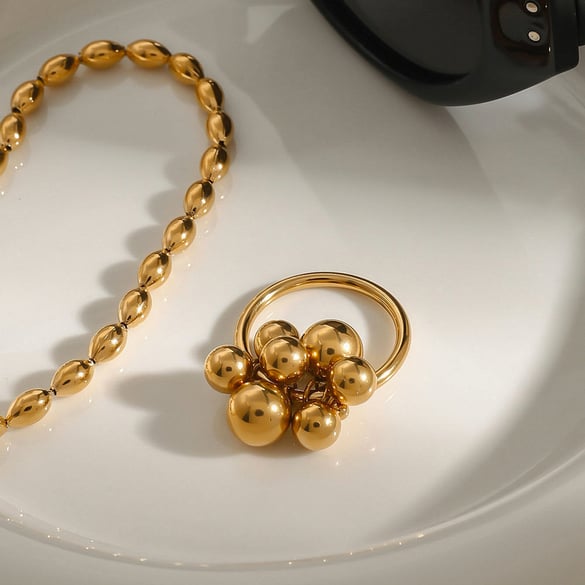 1 paio di anelli singoli da donna in acciaio inossidabile placcato oro con sfera in Europa e America, serie semplice