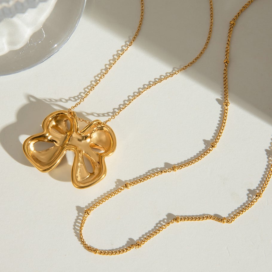 1 pezzo semplice serie classico fiocco nodo acciaio inossidabile placcato oro 18K donne collane a strati Immagine4