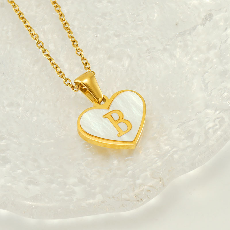 Collar con colgante de acero de titanio chapado en oro de 18 quilates para mujer, serie Simple, con forma de corazón, para uso diario. Imagen5