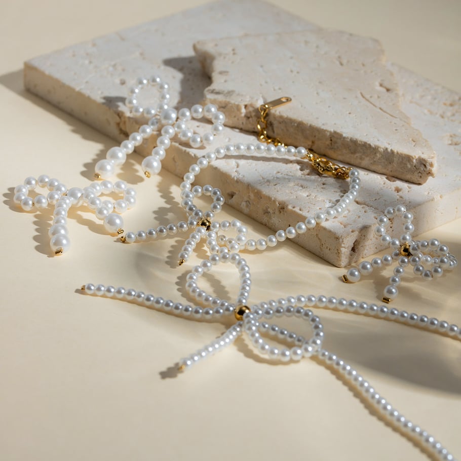 Europäische und amerikanische grenzüberschreitende INS-Stil Mode Licht Luxus High-End 18 Karat Gold Edelstahl Bogen Perle Ohrringe Ohrringe Zubehör für Frauen Bild6