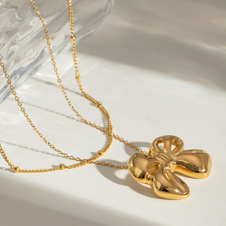 1 pezzo semplice serie classico fiocco nodo acciaio inossidabile placcato oro 18K donne collane a strati Immagine2