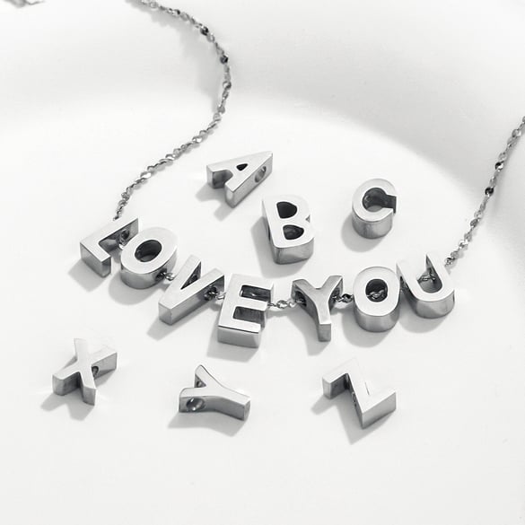 1 par de colgantes unisex con letras informales de serie simple