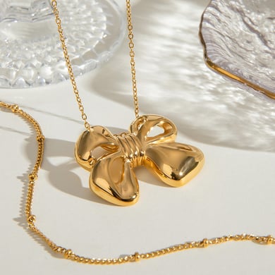 1 pezzo semplice serie classico fiocco nodo acciaio inossidabile placcato oro 18K donne collane a strati h5 Immagine3