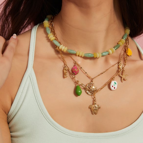 Delicata serie Marine in acciaio inossidabile color oro con ciondolo in pietra naturale da donna