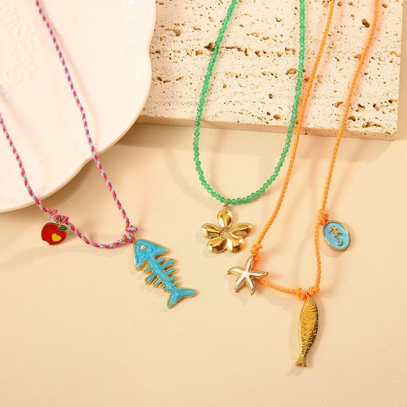 Collane con ciondolo a forma di pesce in acciaio inossidabile color oro da donna 2