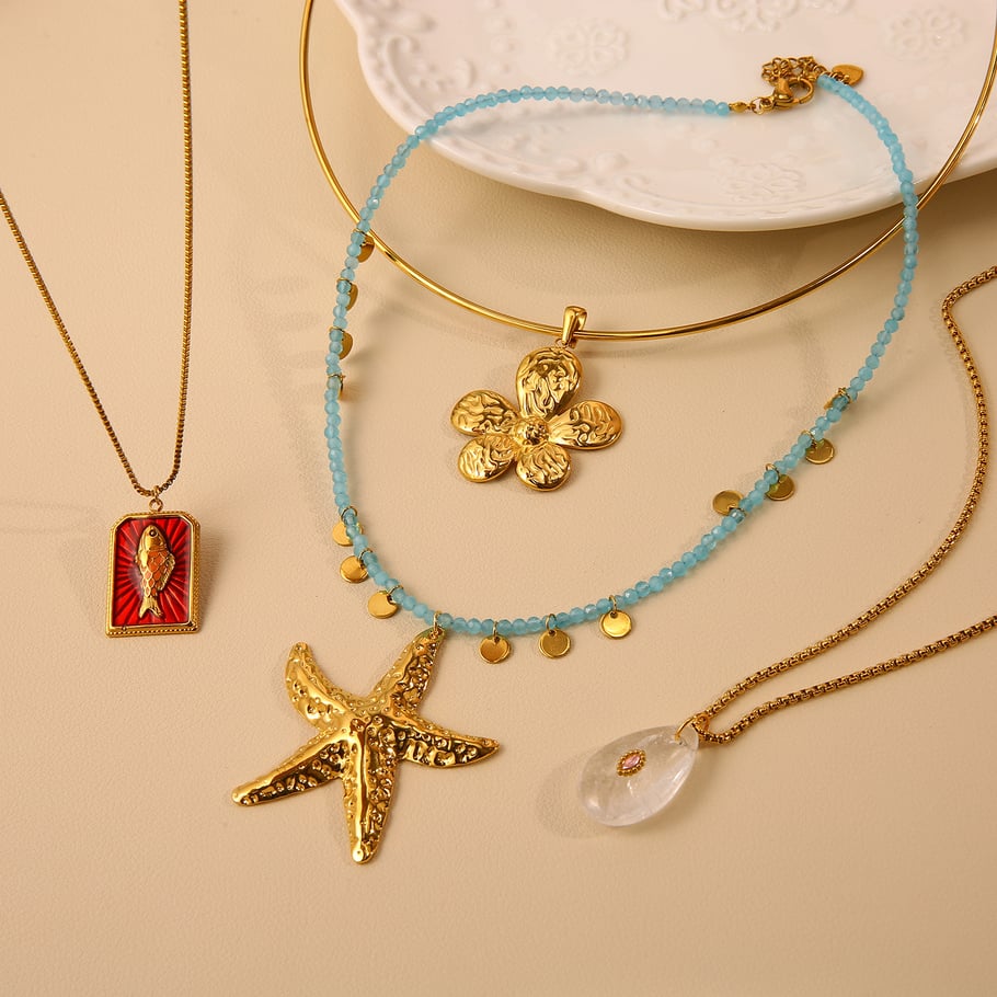 Collane con ciondolo a forma di stella marina oceanica in acciaio inossidabile color oro da donna Immagine5