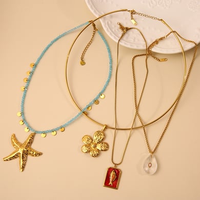 Collane con ciondolo a forma di stella marina oceanica in acciaio inossidabile color oro da donna h5 Immagine4